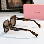 MiuMiu sunglasses, tortoiseshell frames with logo detail on temple arms