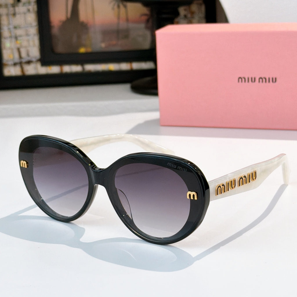 MiuMiu round sunglasses, black frames, dark tinted lenses