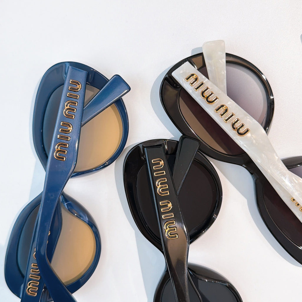 MiuMiu sunglasses set, blue and black frames with gold logo temples