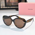 MiuMiu round sunglasses, dark tortoiseshell frames, brown lenses
