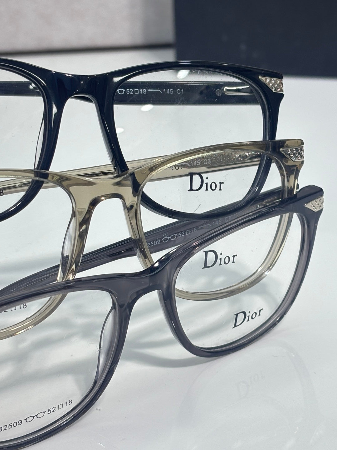 Dior eyeglasses close-up with logo temples and engraved size markings