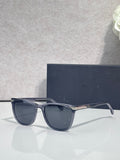 Dior dark blue sunglasses with oversized square lenses and thin metal rims