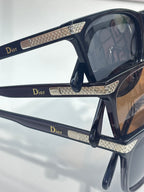 Dior sunglasses with rhinestone-studded temple arms and dark tinted lenses