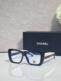 Chanel glasses with dark blue square frames and clear lenses, gold-tone arms