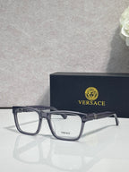 Versace eyeglasses, dark rectangular acetate frame with clear lenses and gold logo detail
