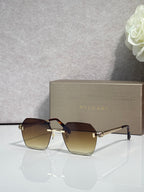 Square gradient amber-brown sunglasses with dark frame and gold bridge