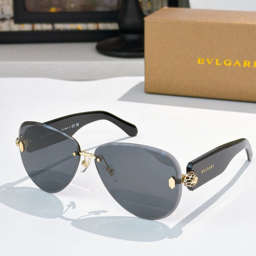 Bvlgari sunglasses with dark blue lenses, black frame, and gold accents.