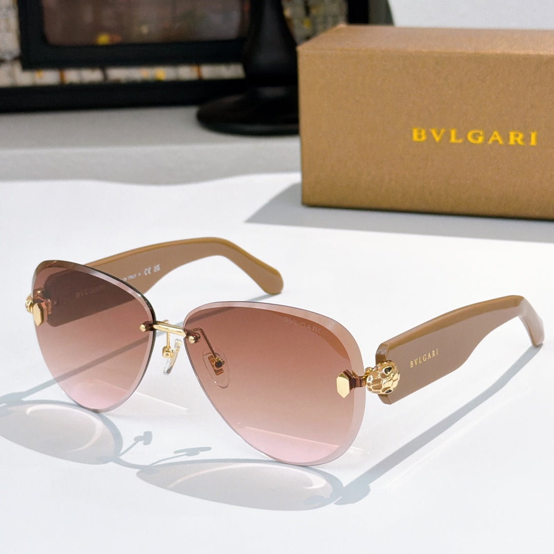 Bvlgari sunglasses with pink gradient lenses, tortoiseshell frame, and gold details.