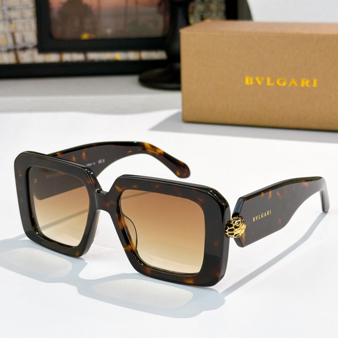 Square sunglasses, dark tortoiseshell frames with amber gradient lenses, gold logo