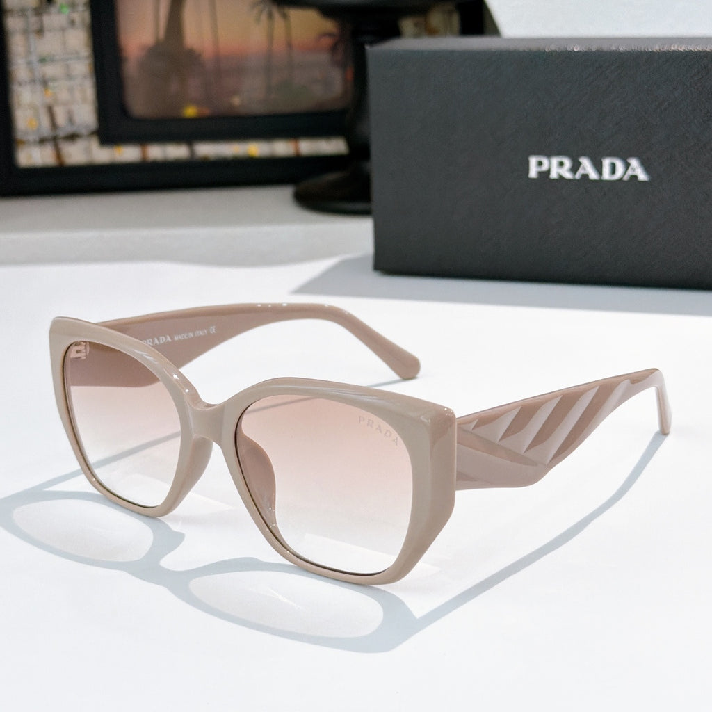 Prada cat-eye sunglasses with light lenses and beige-pink translucent frames