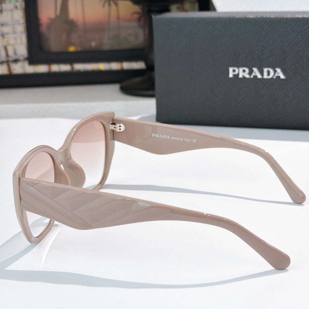 Prada light pink cat-eye sunglasses side view with temple detail