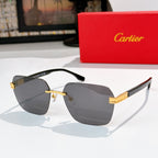 Designer glasses with black frame and dark gray-tinted lenses, gold hinge accents
