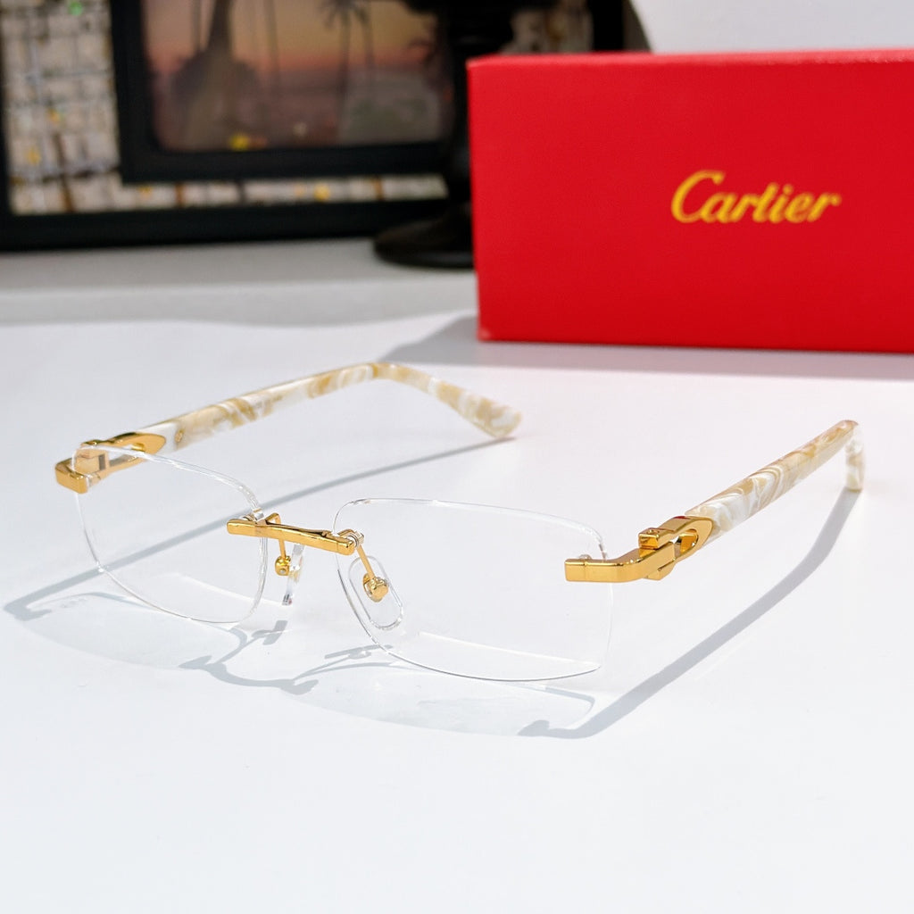 Cartier sunglasses, clear frame with blue gradient lenses and gold accents