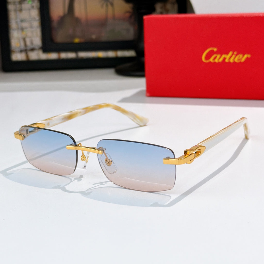 Cartier sunglasses, clear frame with light blue lenses and gold accents