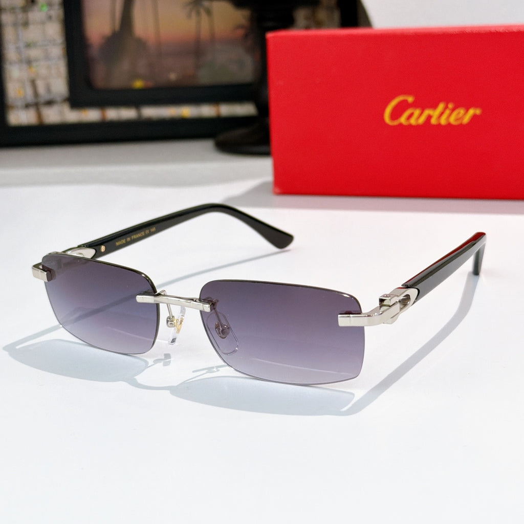 Cartier sunglasses, black frame with dark lenses and gold metal accents