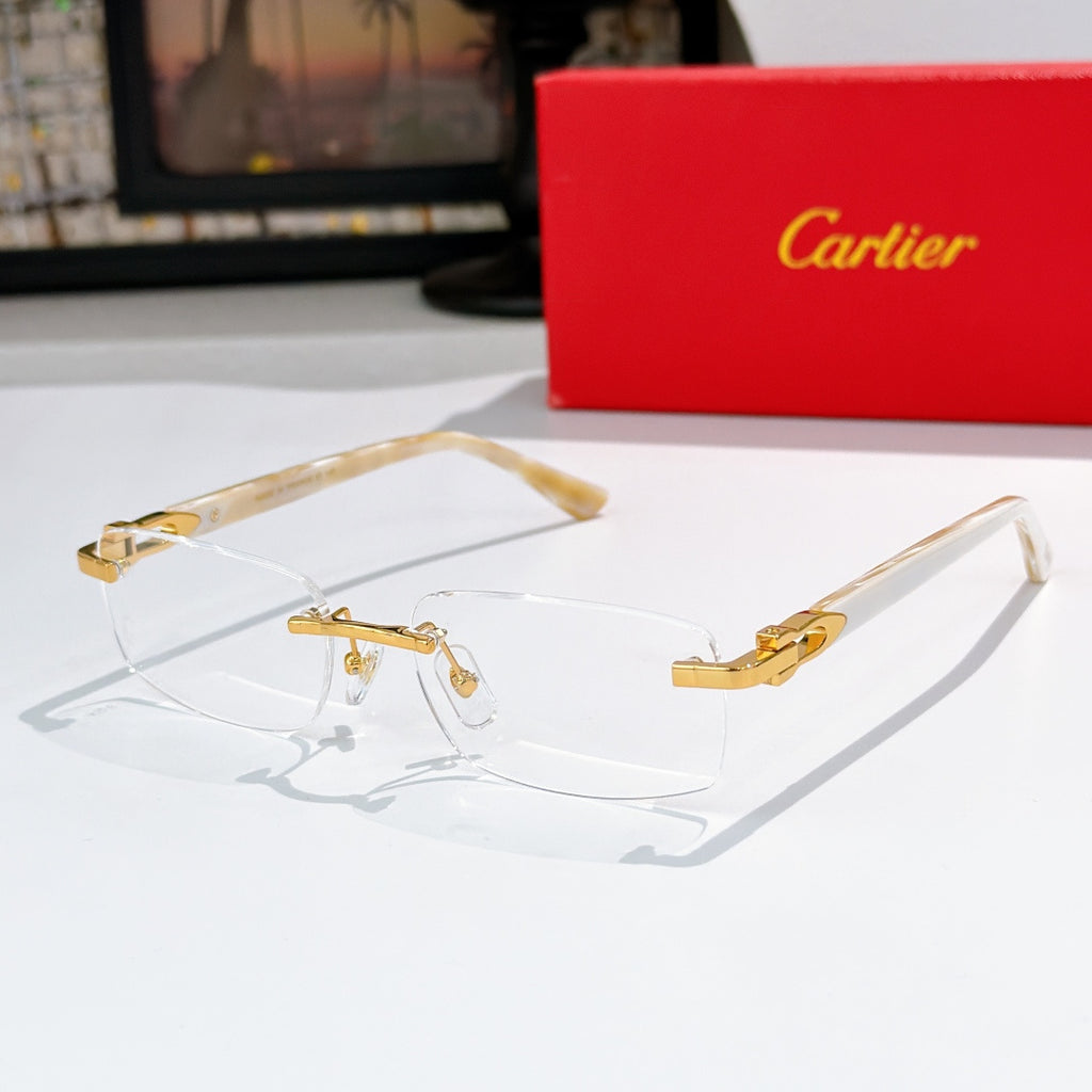 Cartier sunglasses, clear frame with blue tinted lenses and gold accents