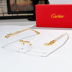Cartier sunglasses, clear frame with blue tinted lenses and gold accents