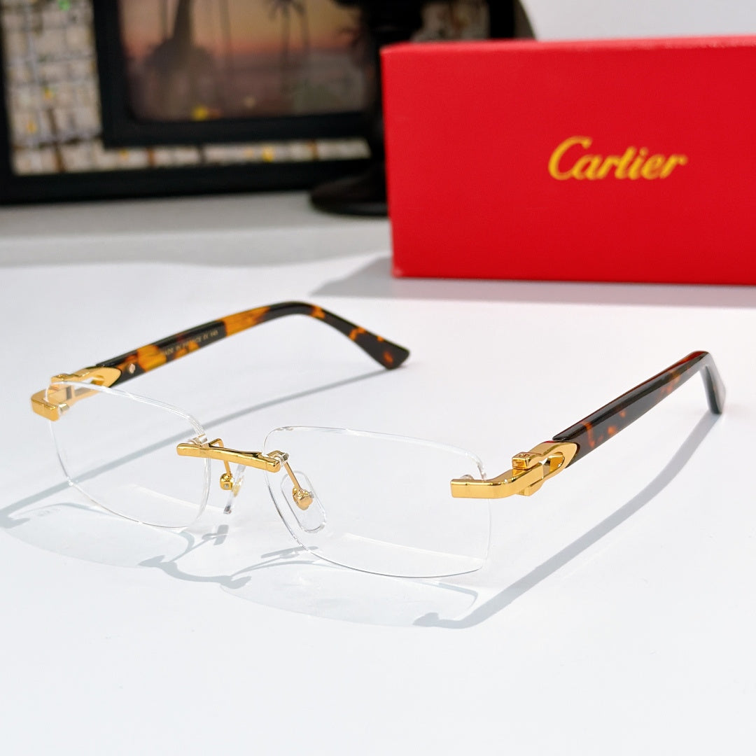 Cartier eyeglasses, tortoise temples with clear lenses and gold accents