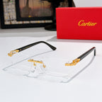 Cartier eyeglasses, black frame with clear lenses and gold accents