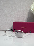 Eyeglasses with clear lenses, silver metal rectangular frame, dark arms
