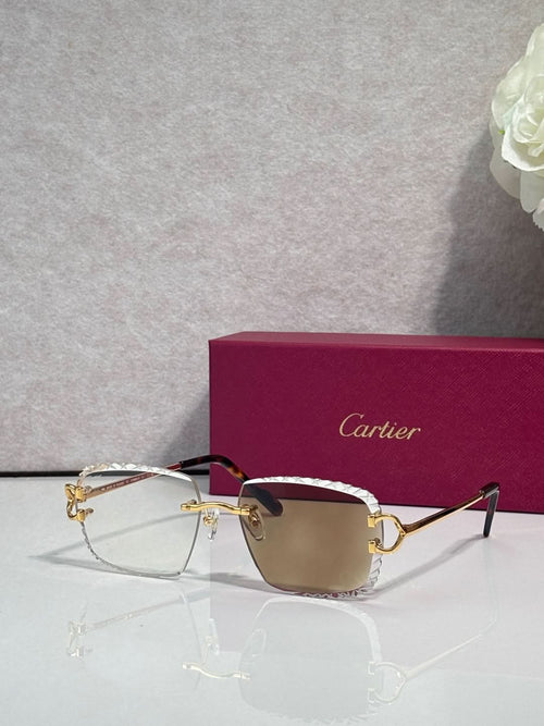 Cartier eyeglasses with clear lenses, gold and silver metal rectangular frame, dark arms