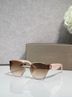 Bvlgari sunglasses with bronze-brown gradient lenses, gold-tone and white frame