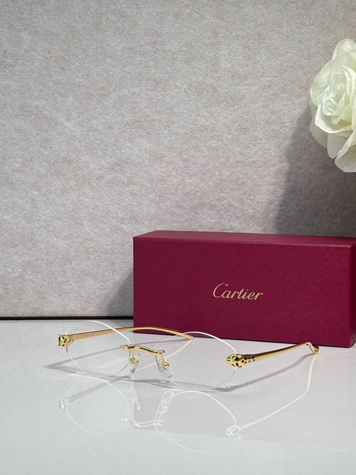 Cartier eyeglasses with gold-tone thin metal frame and clear lenses