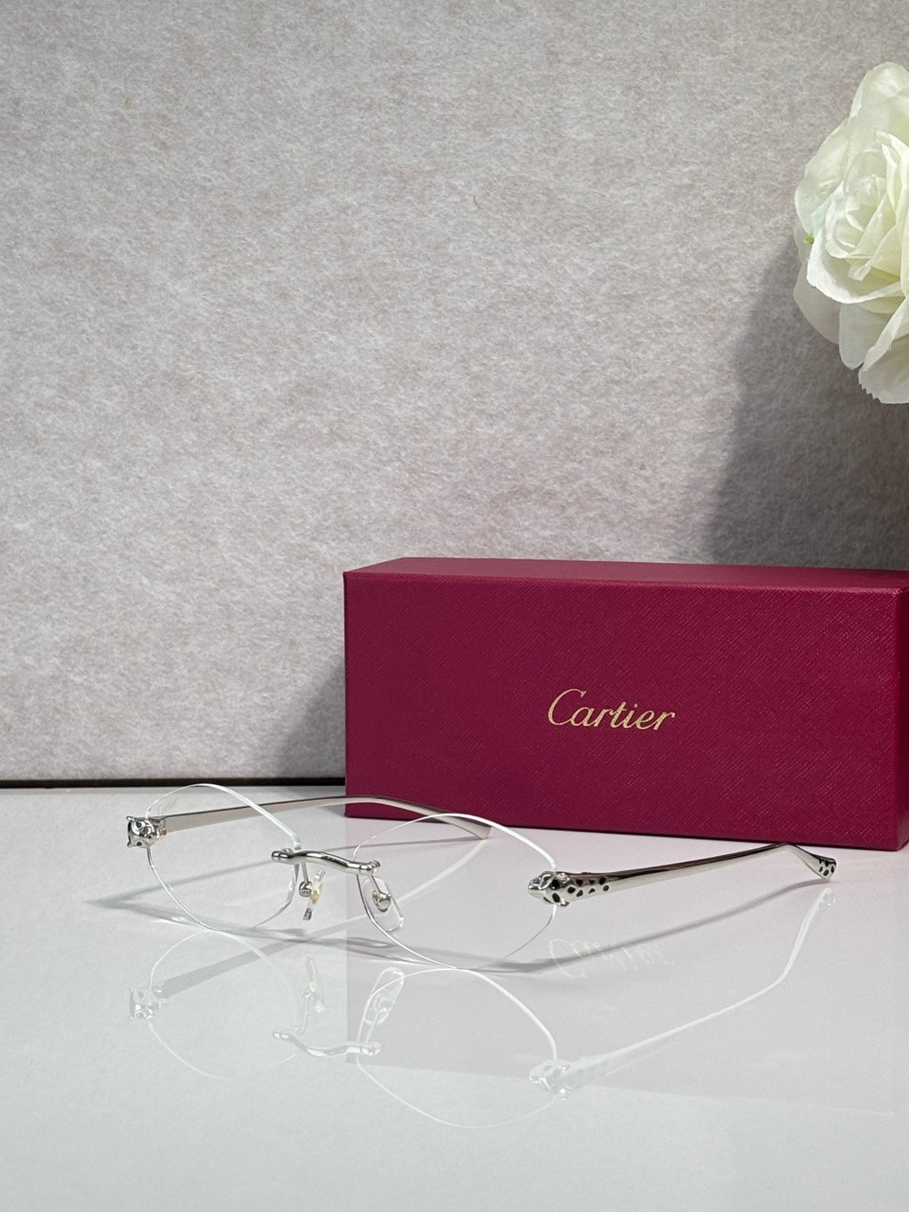 Cartier eyeglasses with silver-tone thin metal frame and clear lenses
