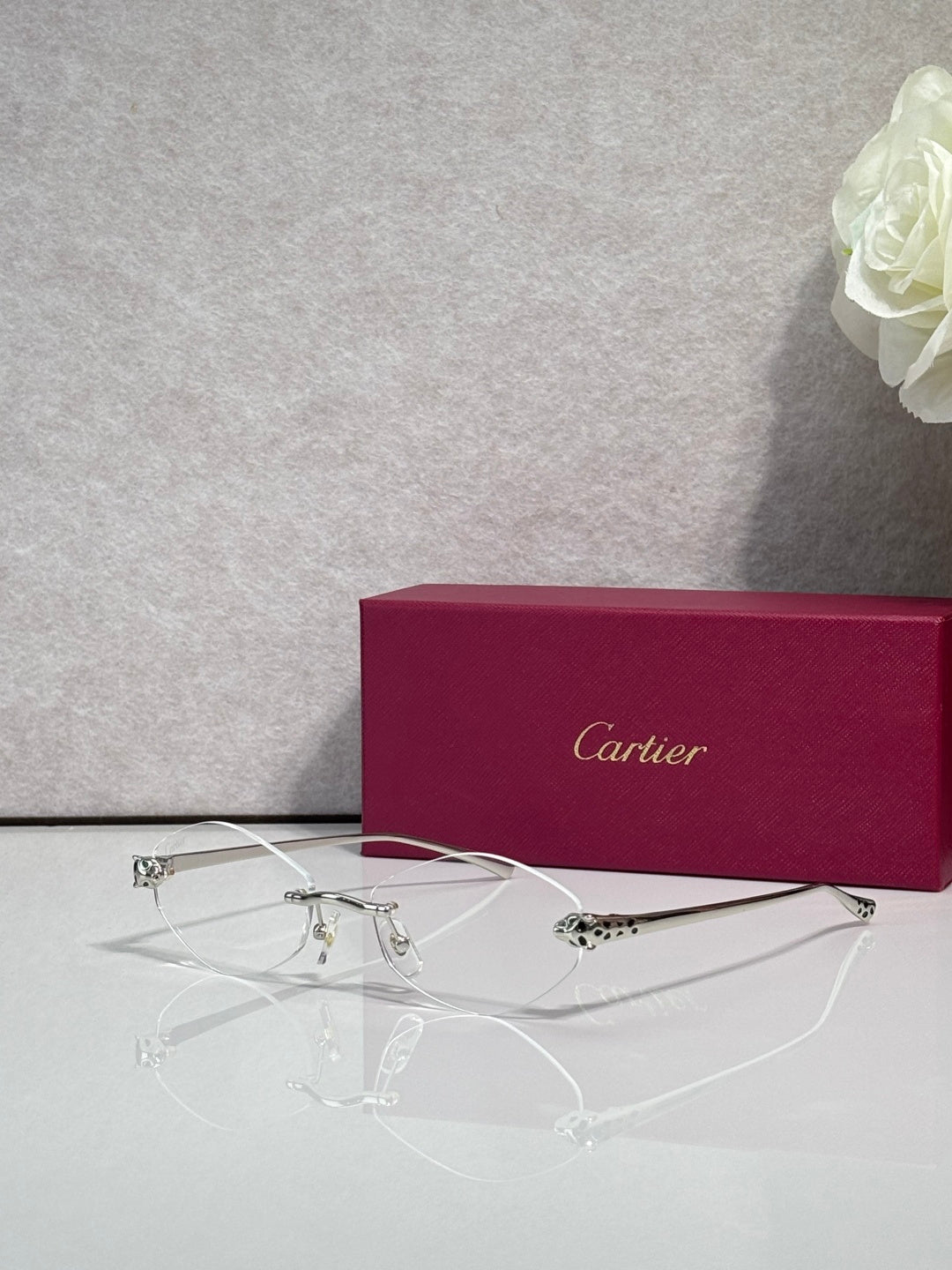 Cartier eyeglasses with silver-tone thin metal frame and clear lenses