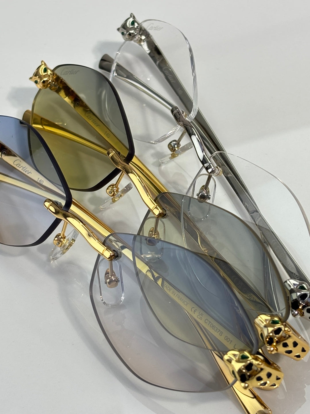 Cartier eyeglasses with gold and silver-tone frames and tinted lenses