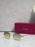 Cartier sunglasses with gold frame and yellow-tinted lenses