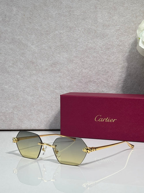 Cartier sunglasses with gold frame and yellow-tinted lenses