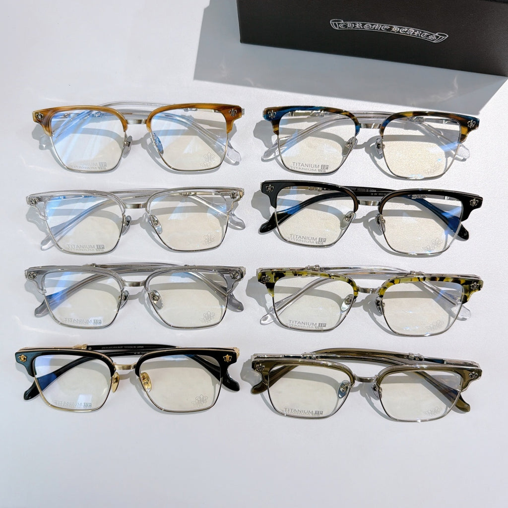 Assorted eyeglasses with clear lenses and mixed frame colors, arranged in rows