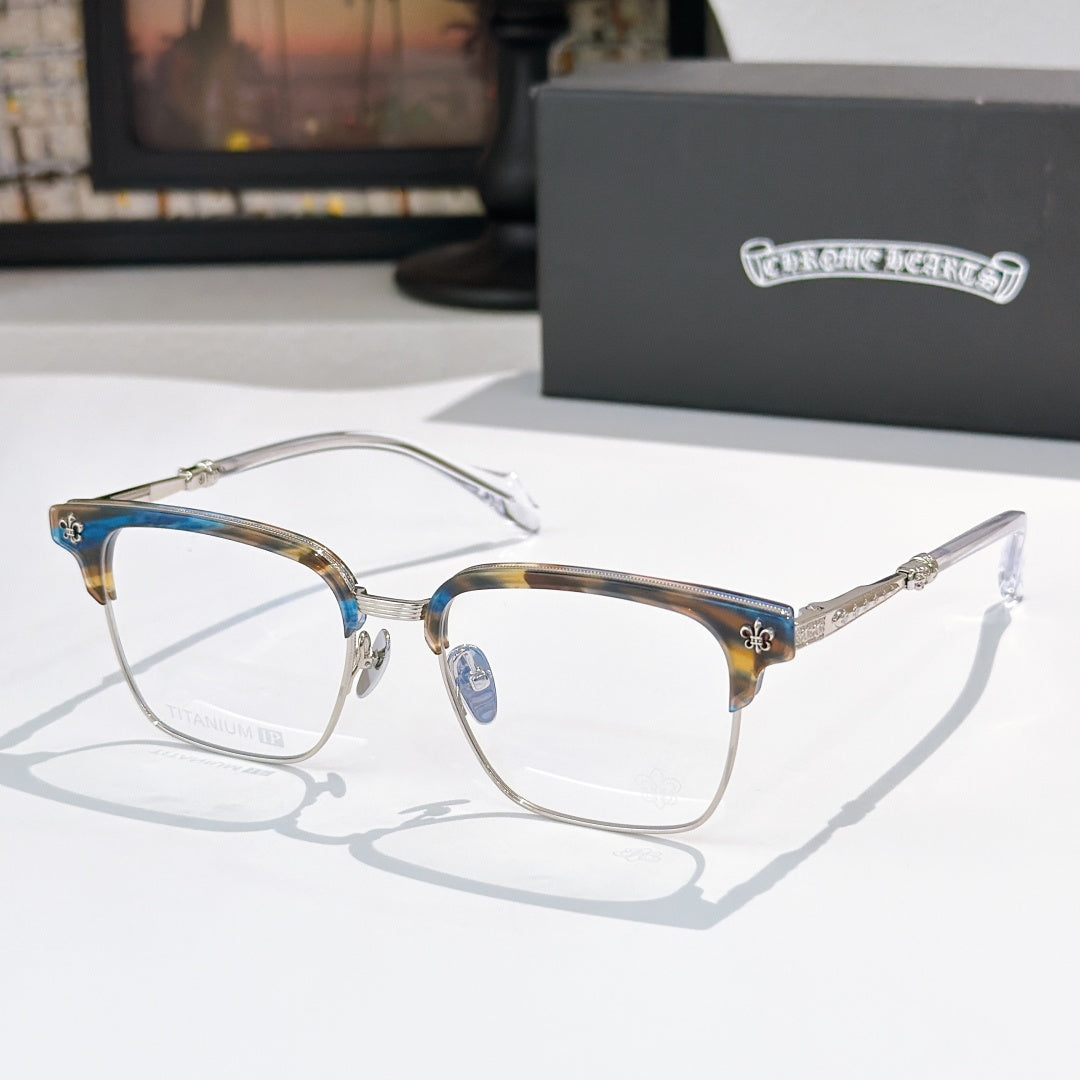 Square eyeglasses with clear lenses, chrome frame, and gold-and-green patterned temples