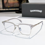 Square eyeglasses with clear lenses, chrome frame, and silver patterned temple details