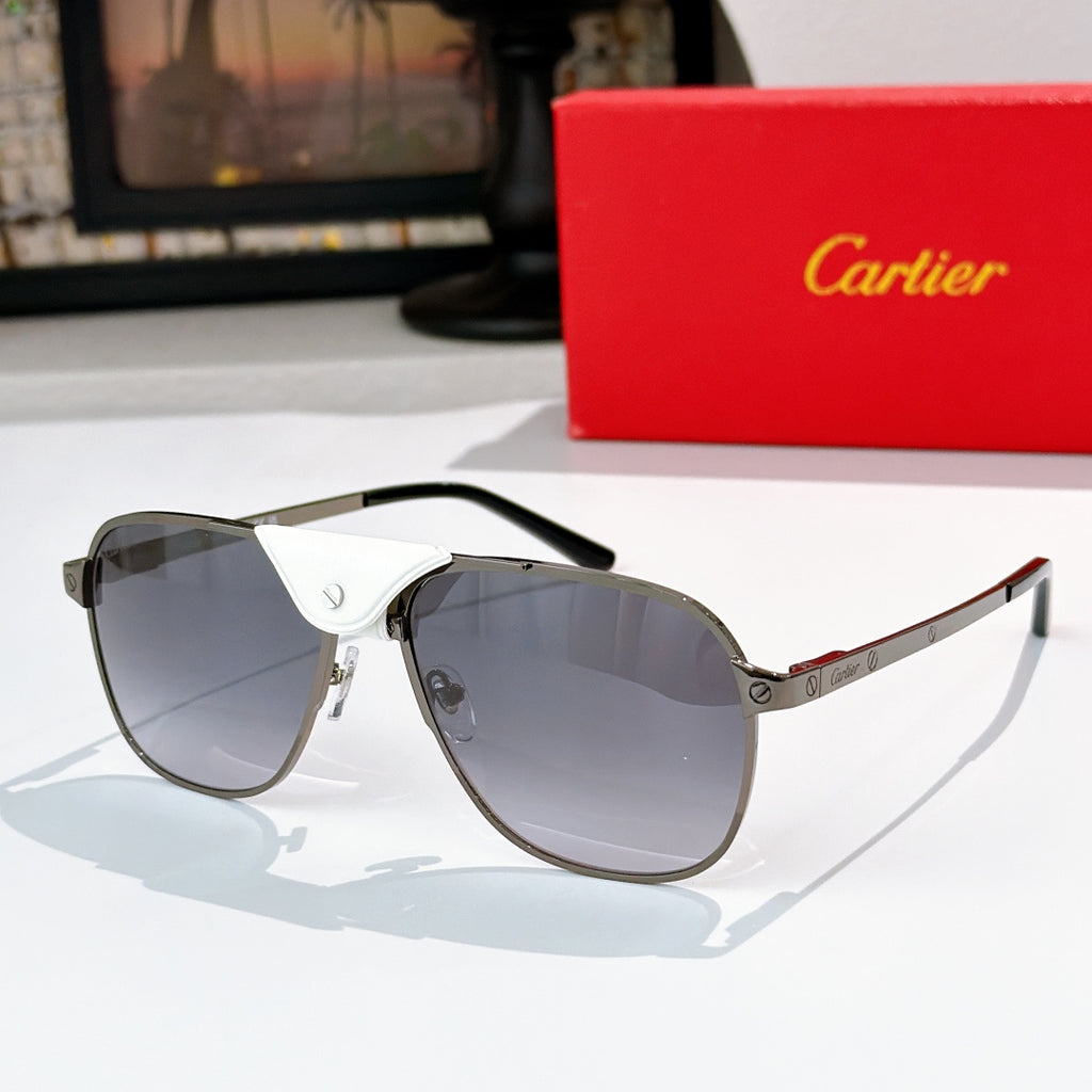 Sunglasses with dark frames, dark gray tinted lenses, and black leather bridge detail