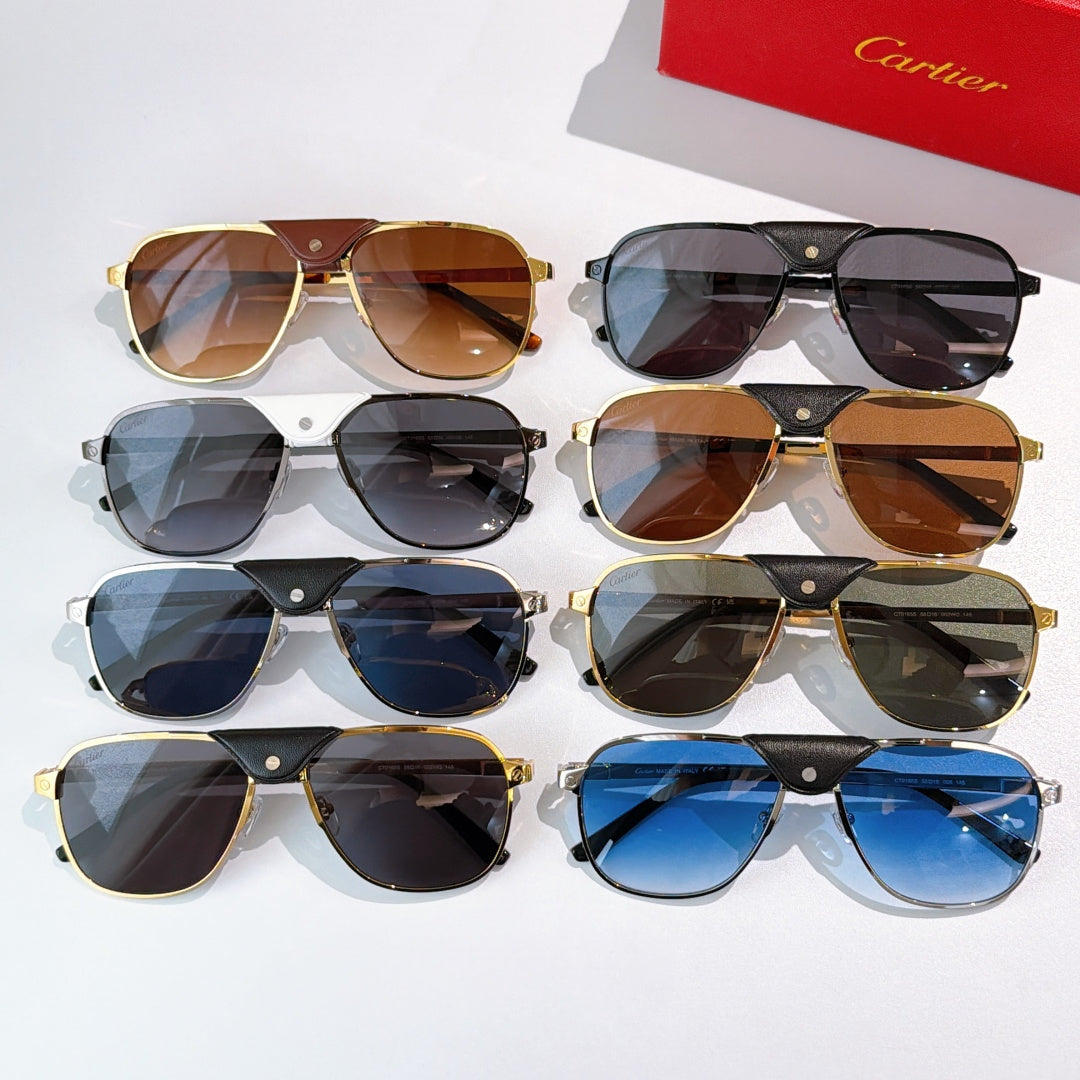 Assorted sunglasses with mixed frame colors and tinted lenses, each with a leather bridge detail