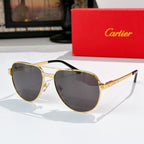 Aviator-style sunglasses with gold frame and dark gray lenses