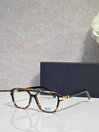 Rectangular eyeglasses with tortoiseshell frame and clear lenses, Dior logo on bridge