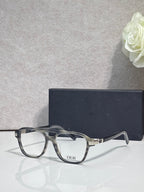 Rectangular eyeglasses with dark frame, clear lenses, and Dior logo on temple