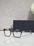 Dior eyeglasses with dark tortoiseshell frames and rectangular clear lenses