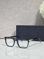 Dior eyeglasses with black acetate frames and rectangular clear lenses