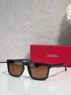 Prada sunglasses with dark brown lenses and dark navy rectangular frames