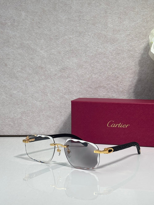 Cartier eyeglasses with dark acetate frame, gold temples, clear lenses