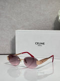 Red round sunglasses with gold-tone hinges and purple tinted lenses