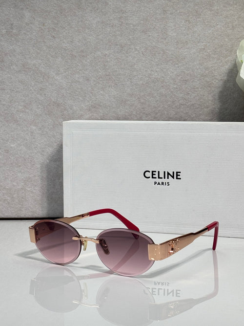Red round sunglasses with gold-tone hinges and purple tinted lenses