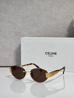 Tortoiseshell round sunglasses with gold-tone hinges and brown tinted lenses