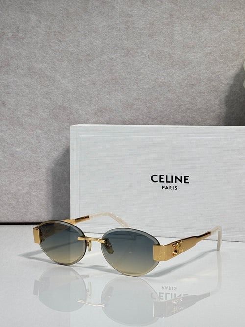 Celine glasses with gold frames, dark green-tinted lenses, thin metal arms