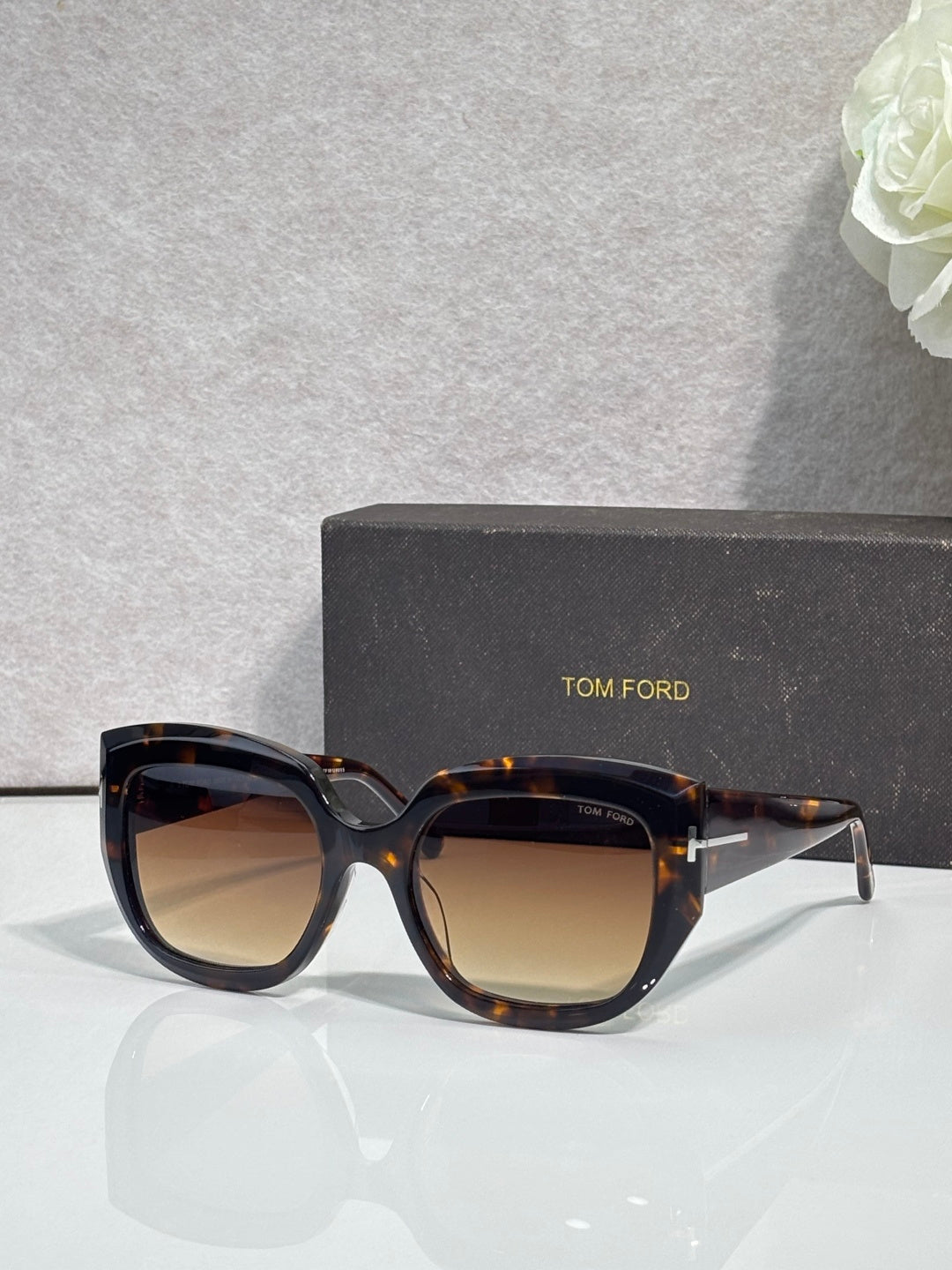 Square sunglasses with tortoiseshell frames and brown-tinted lenses, TOM FORD temple branding