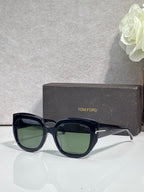 Square sunglasses with dark frames and green-tinted lenses, TOM FORD temple branding